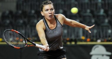 Simona Halep hitting a volley